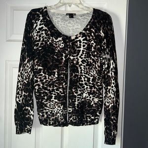 Brown, black and cream cardigan.